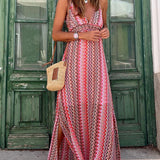 Red halterneck maxi dress with zigzag tribal pattern, V-neck and flowing skirt