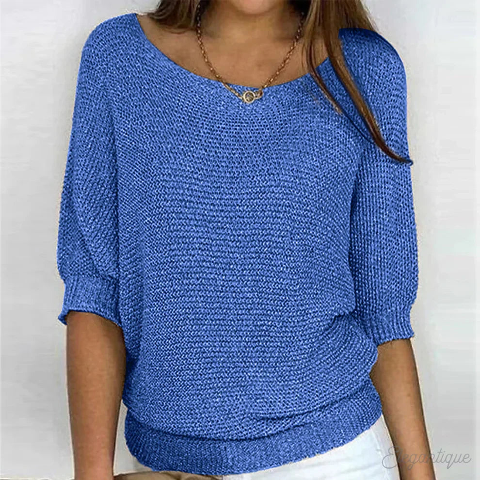 Eunice™ knit top in blue; relaxed fit, boat neckline, elbow-length sleeves, ribbed cuffs.