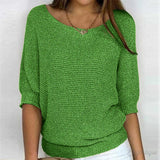 Eunice™ knit top in green; relaxed fit, boat neckline, elbow-length sleeves, ribbed cuffs.