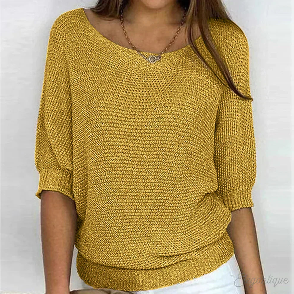 Eunice™ knit top in yellow; relaxed fit, boat neckline, elbow-length sleeves, ribbed cuffs.