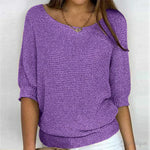 Eunice™ knit top in purple; relaxed fit, boat neckline, elbow-length sleeves, ribbed cuffs.