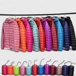 Hooded puffer jacket in multiple colors on hangers: pink, orange, teal, red, purple, blue, black