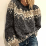 Charcoal fair isle knit sweater close-up, cream fair isle neckline and sleeve