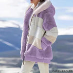 Fluffy winter coat in purple with cream sherpa lining and zip front