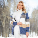 Fuzzy winter coat, white turtleneck layer with blue/gray/cream striped zip hoodie