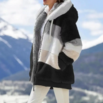 Fuzzy winter coat, black with cream and gray striped panels and hooded zip closure