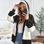 Fuzzy winter coat, black and cream color-block stripes with hood and zip front