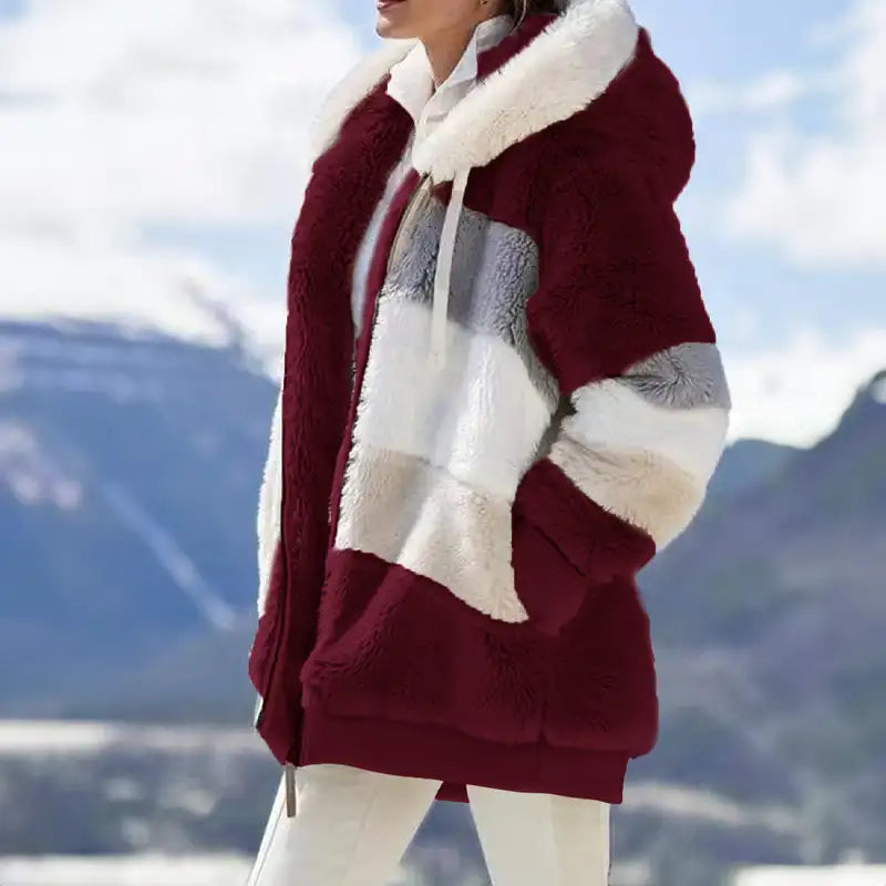 Fuzzy winter coat, deep red with cream striped panels and hooded zip closure