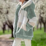 Fuzzy winter coat, mint green with cream striped panels and hooded zip closure