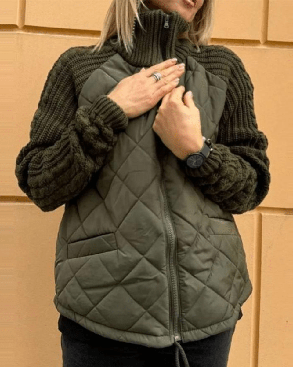 Olive green quilted cardigan with front zipper and chunky knit sleeves