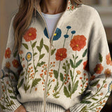 Floral knit cardigan with full zip, front pockets, cream base, orange and blue flowers