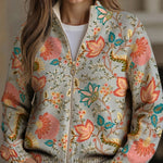 Women's floral knit cardigan with front zipper, long sleeves, multicolor flower print.
