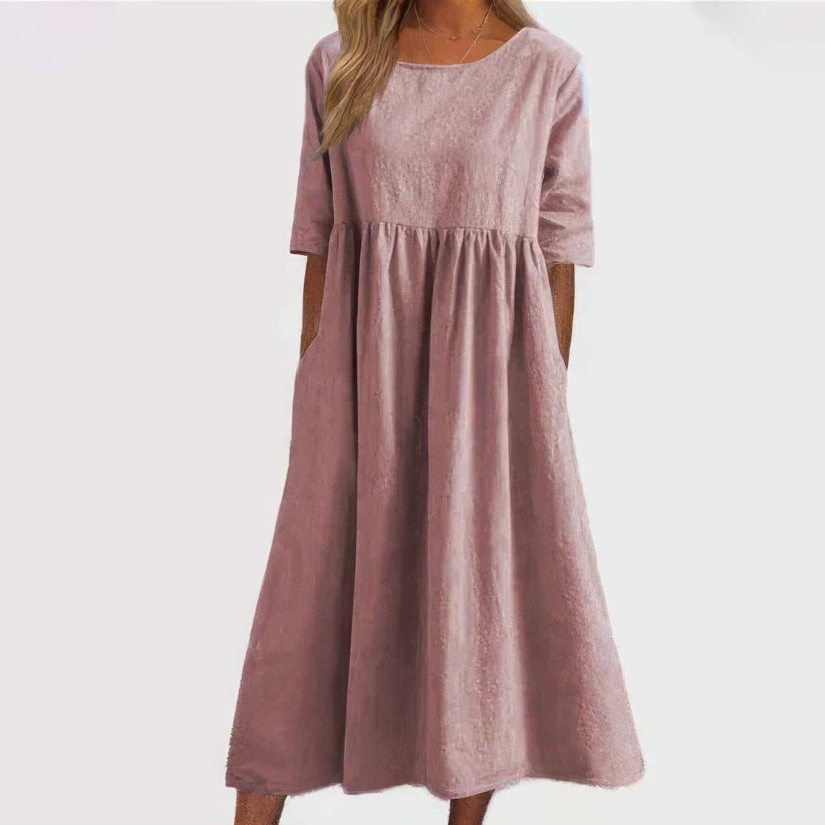 Blush pink cotton round-neck dress with short sleeves and gathered waist