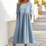 Sky blue cotton round-neck dress with short sleeves and gathered waist