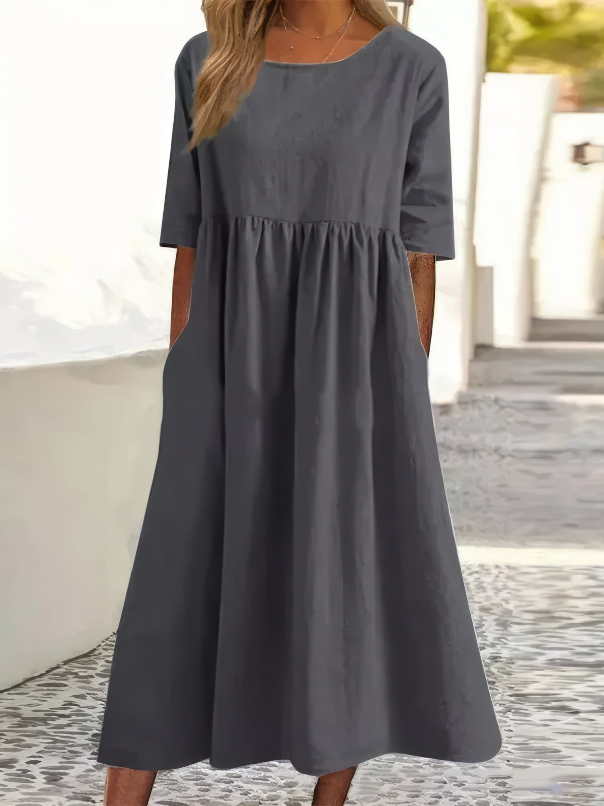 Dark gray cotton round-neck dress with short sleeves and gathered waist